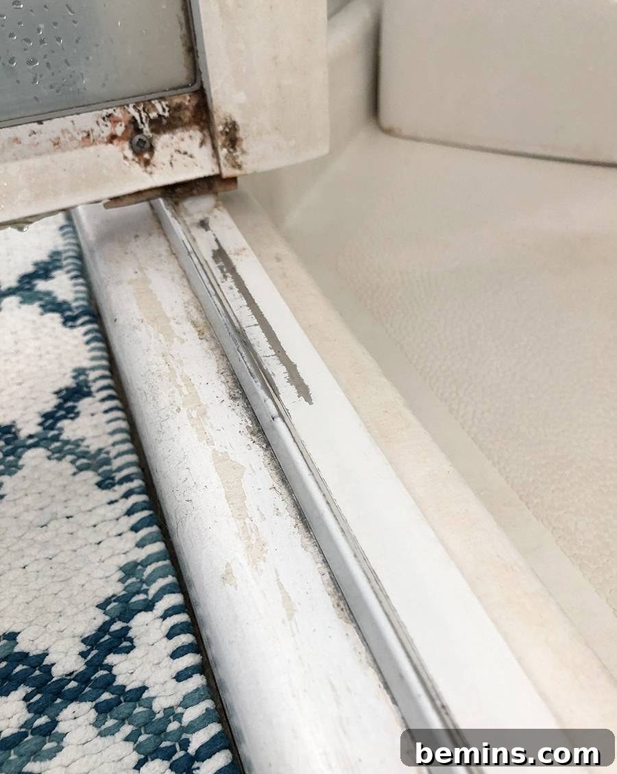 Before: A very dirty shower track.
