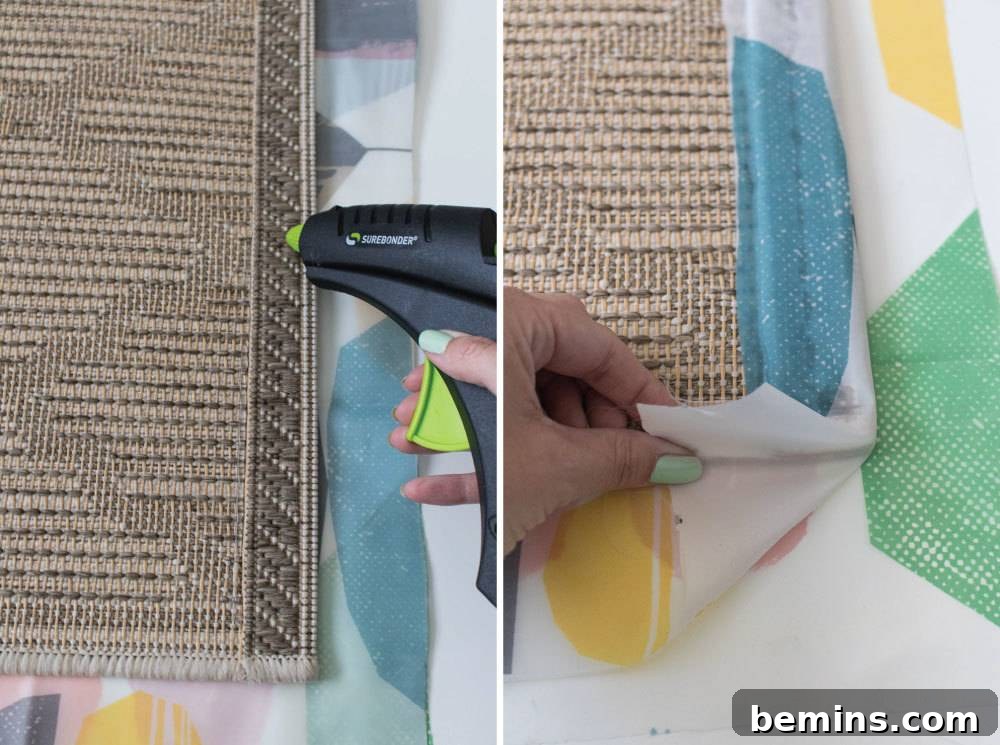 IKEA Shower Curtain Rug DIY: Budget-Friendly Outdoor Decor 8 A person using a glue gun on an arts project, showcasing a tool commonly used for various DIY crafts and repairs.