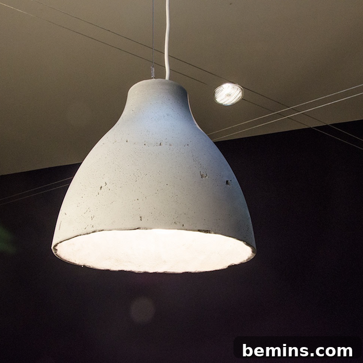 IKEA Shower Curtain Rug DIY: Budget-Friendly Outdoor Decor 10 IKEA hack concrete pendant lamp, demonstrating a creative lighting solution made from repurposed IKEA materials.