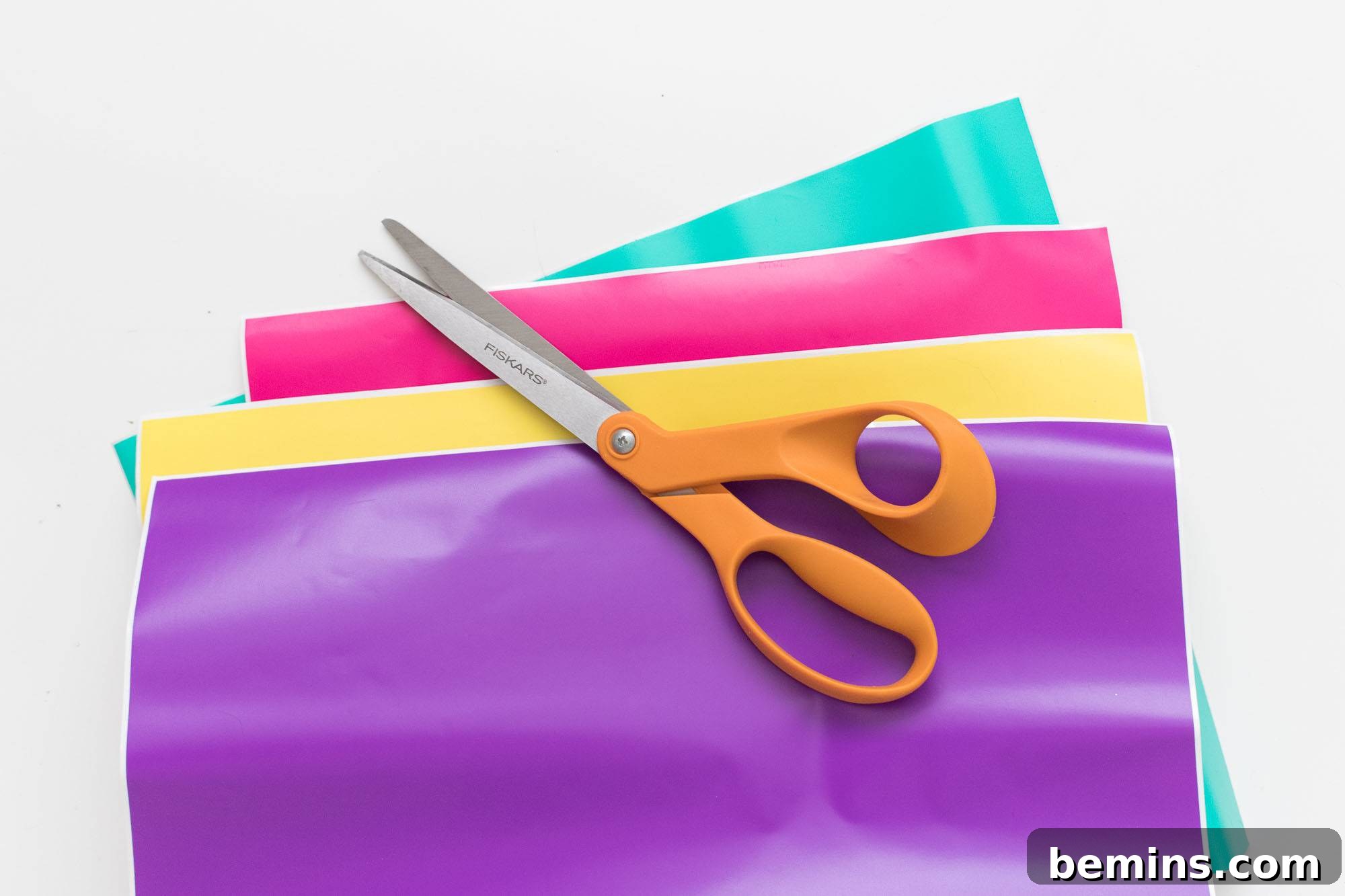 Colorful Vinyl Sheets and Scissors Ready for Decal Creation