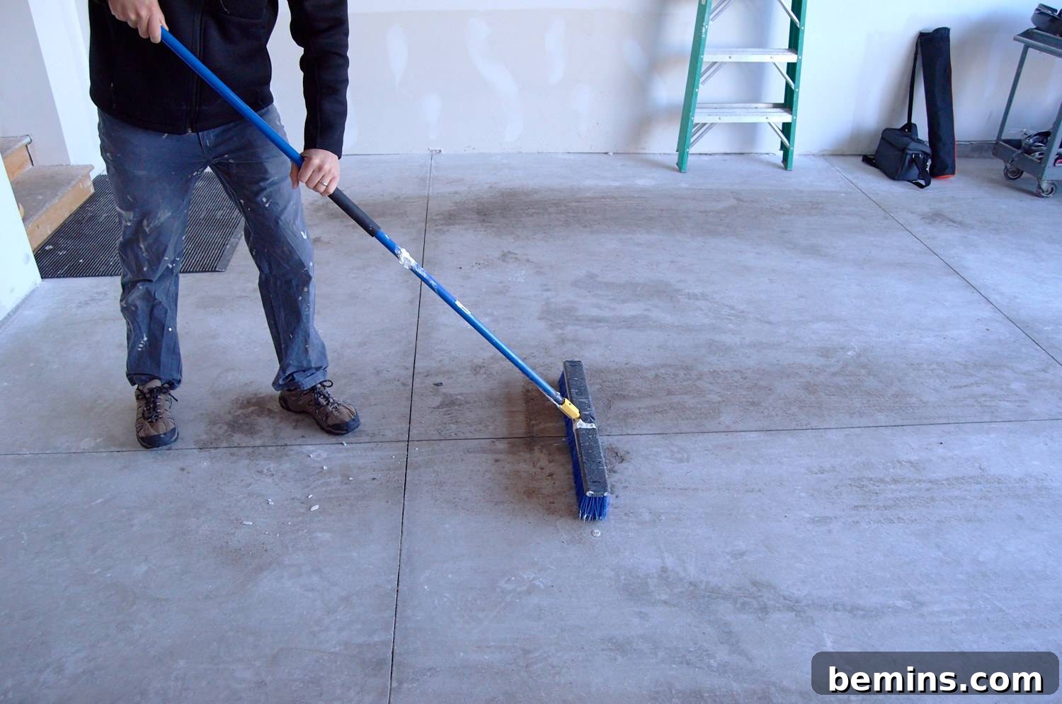 brush garage floor clean of debris before painting