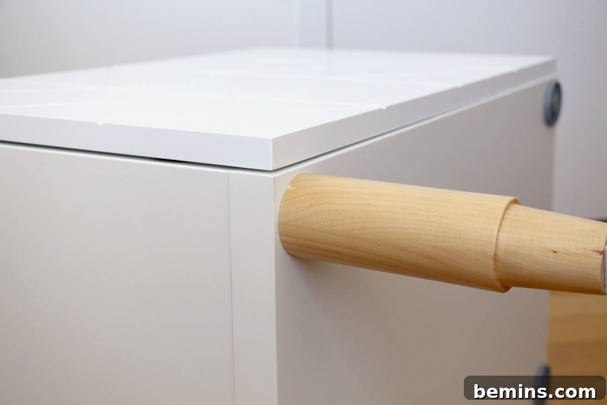 IKEA BESTA Hack: Geometric Nightstand Transformation 8 IKEA BESTA hack: Step 4, close-up of the legs attached to the cabinet