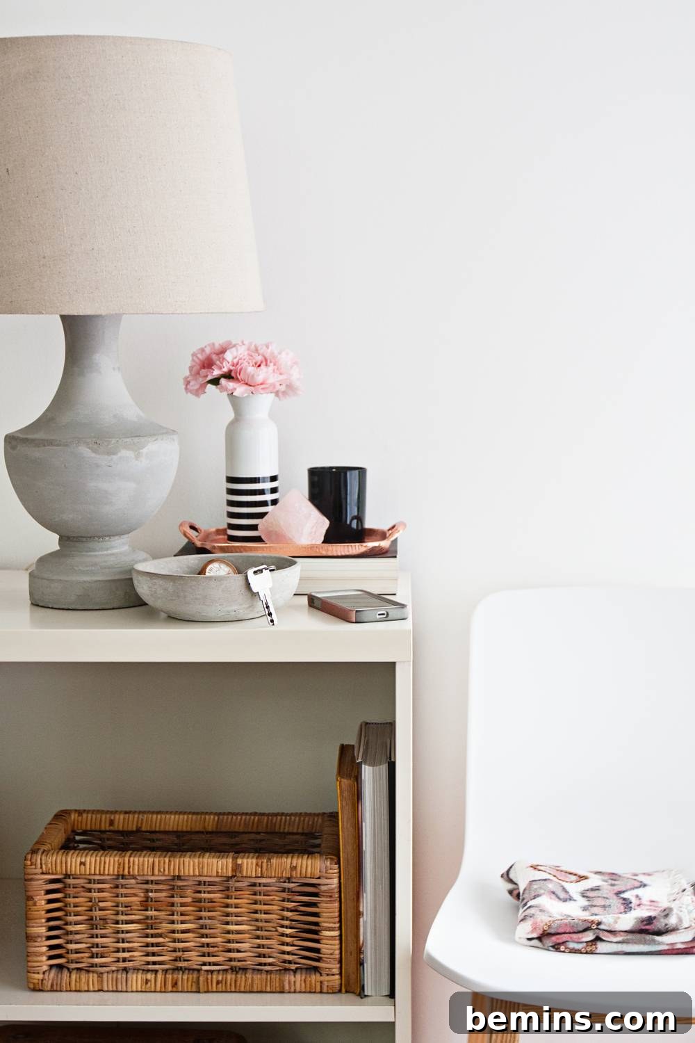 Beige shaded room compliments with a beige shaded side table.