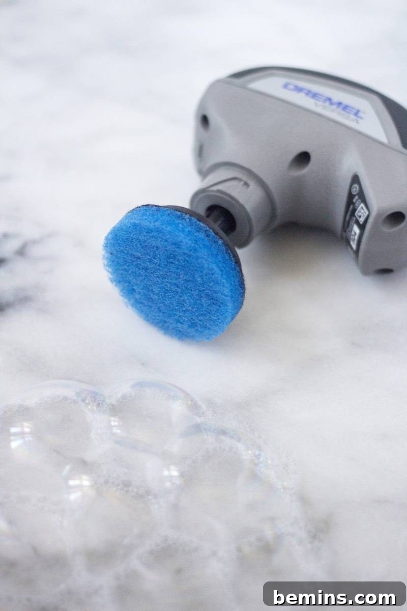 This Gadget Will Revolutionize Your Home Cleaning 3 Close-up of the Dremel Versa 4-Volt Lithium-Ion Power Cleaner Tool