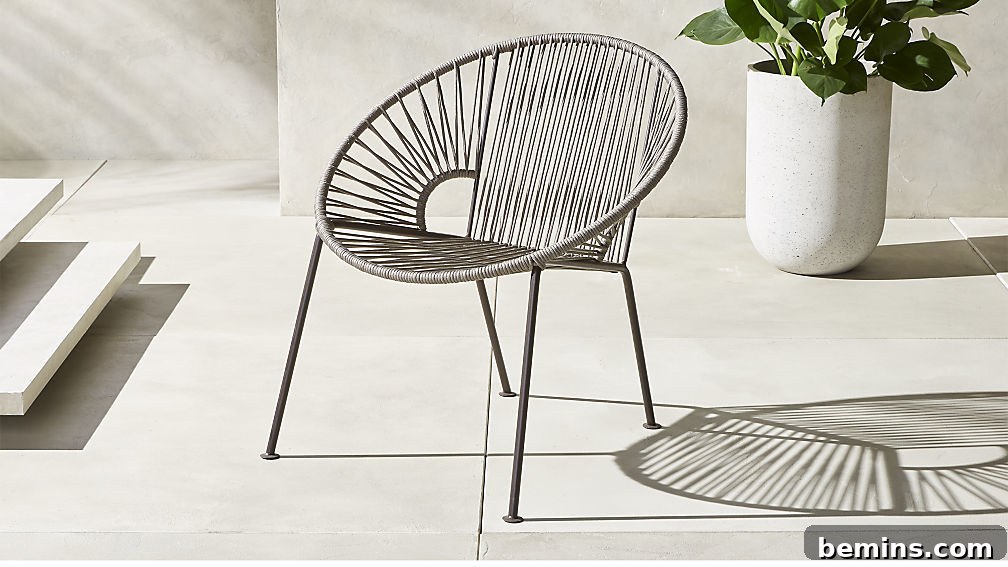 Budget-Friendly Guide to Creating a Stylish Mid-Century Modern Outdoor Space 2 CB2 Ixtapa Chair: A Mid-Century Modern Patio Essential