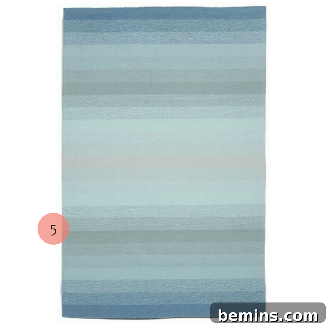 Budget-Friendly Guide to Creating a Stylish Mid-Century Modern Outdoor Space 4 Midcentury Modern Vibe: RugsUSA.com Trans Ocean Ravella Outdoor Rug