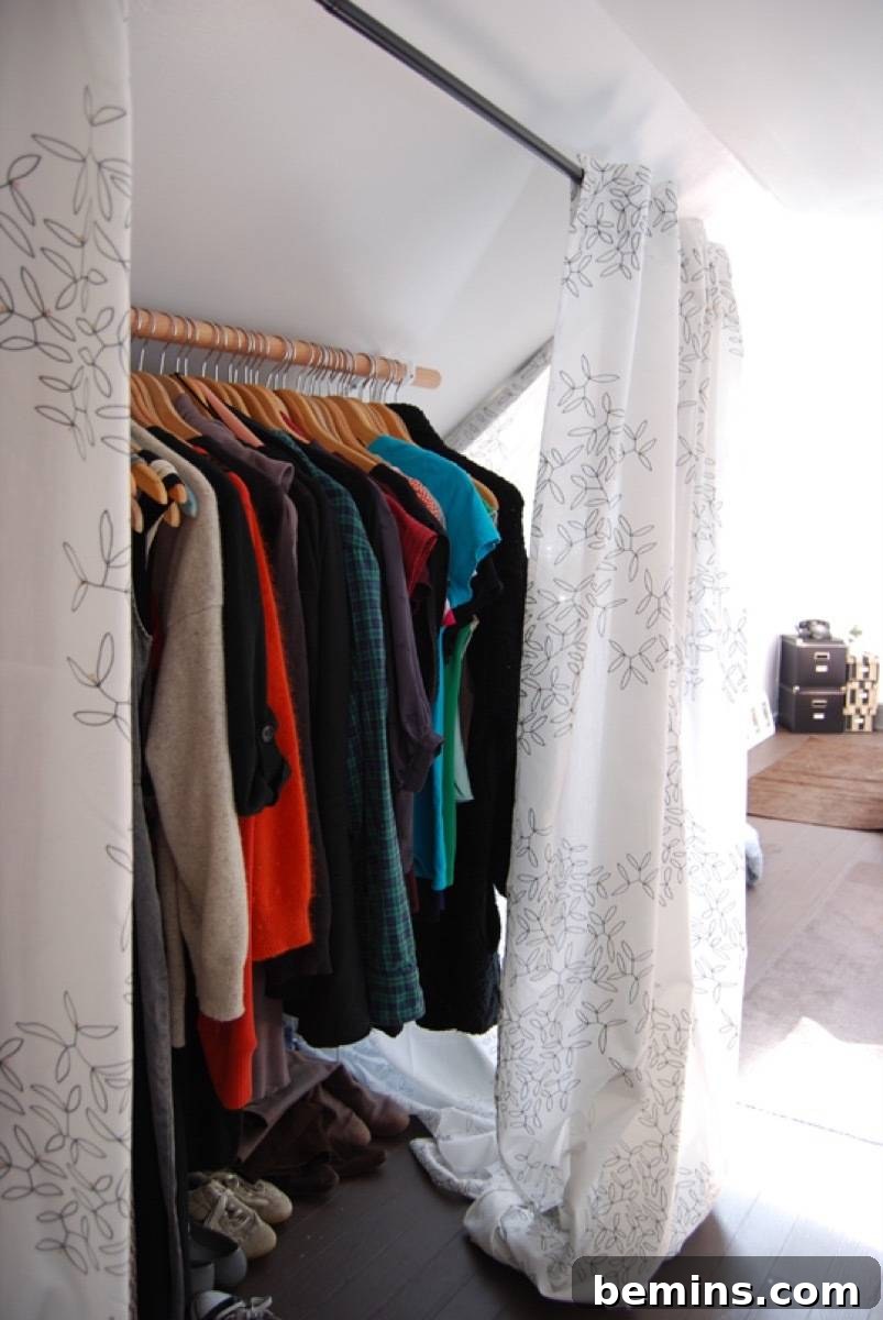 Closet in attic with fabric doors