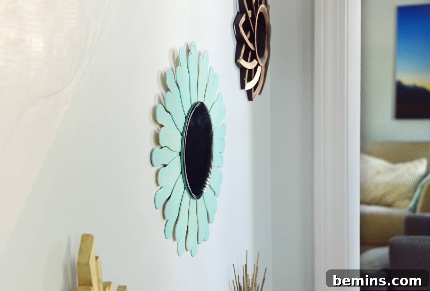 DIY Wooden Starburst Mirror - Displayed on a Wall