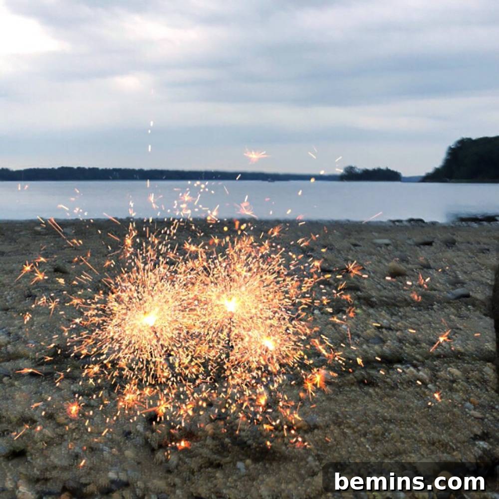 Capturing Magical Sparkler Moments with Your Phone 5 Sparkler photography on a beach at night