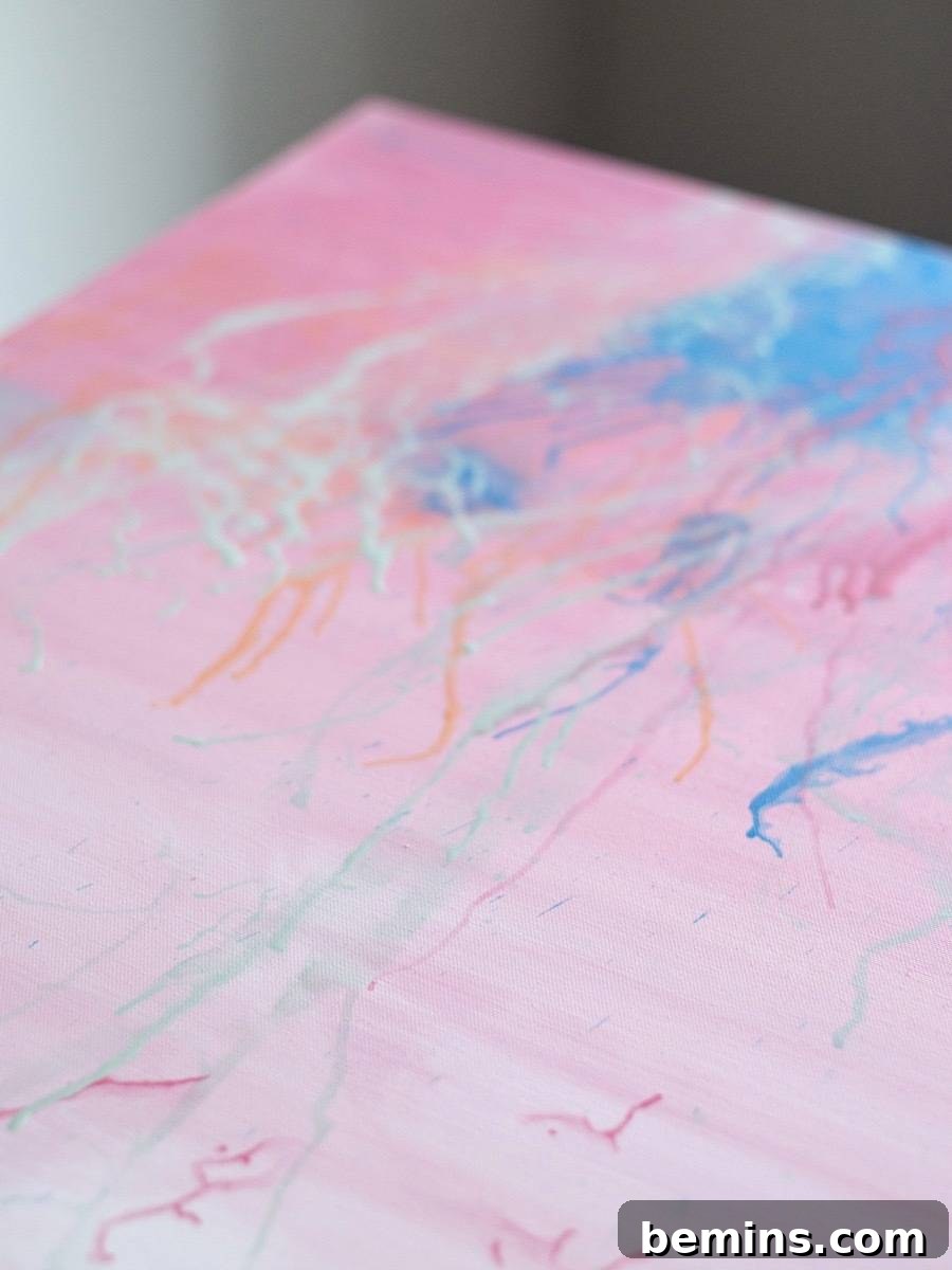 A painting with pink and other colors on it.