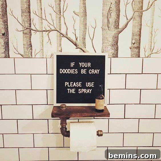 Bathroom with a letter board displaying a funny message