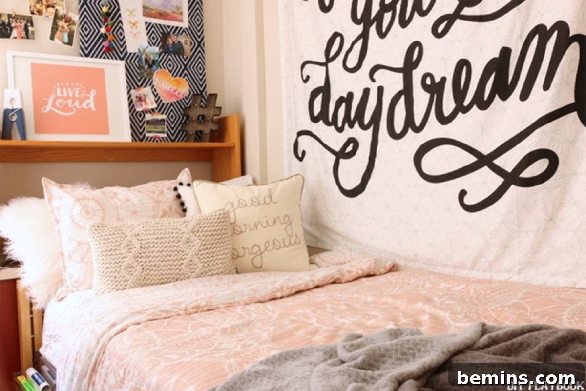After: a bed with pink sheets and three fluffy pillows