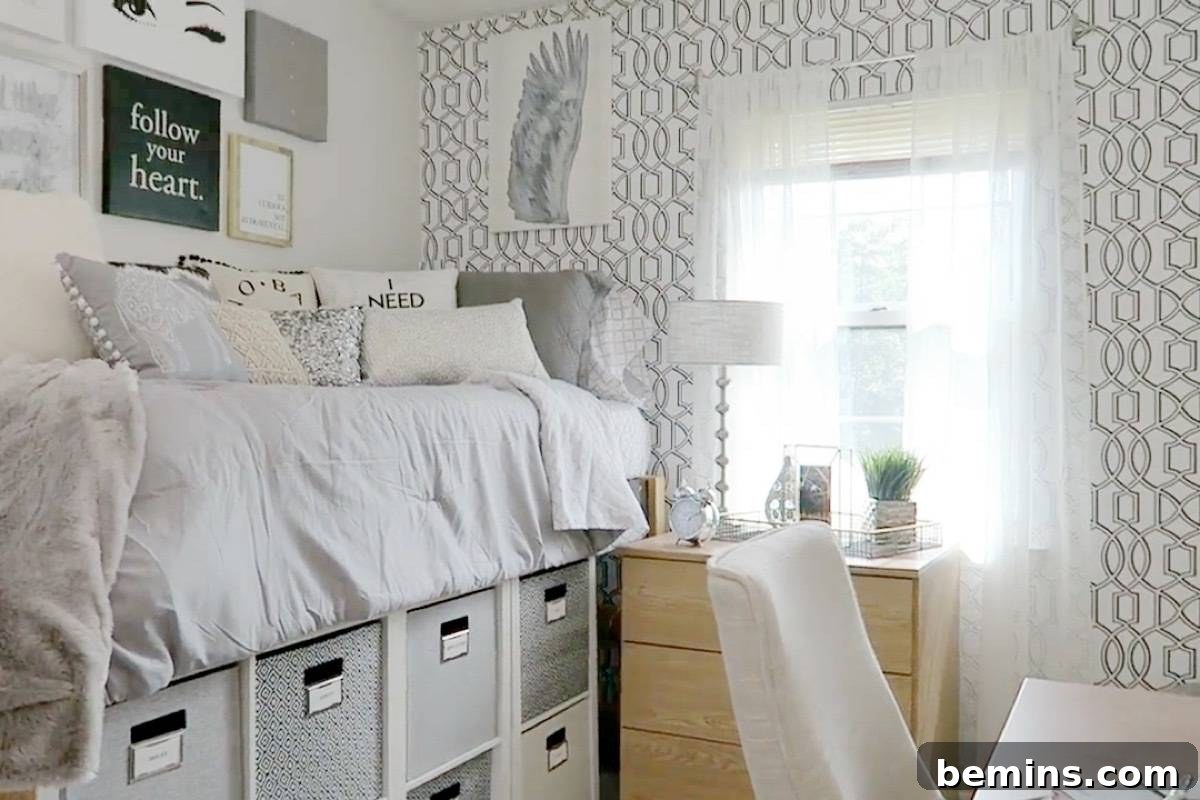 After: A clean well designed white and gray dorm room.