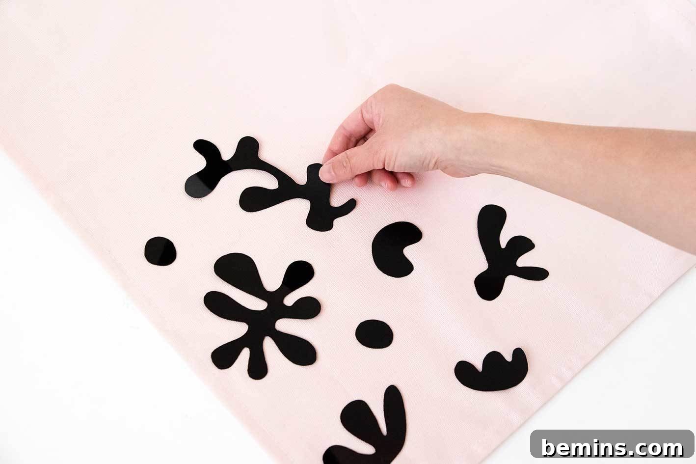 Step 4: Arrange the vinyl leaves on the pillow cover
