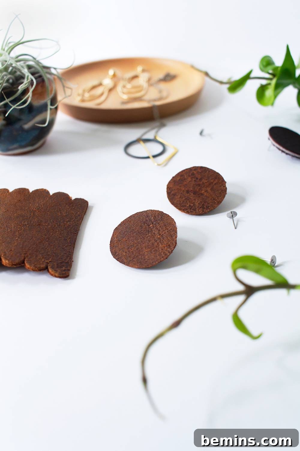 Simple Minimal Leather Earring Project 13 Closeup shot of a DIY leather earring, highlighting its texture and handmade quality.
