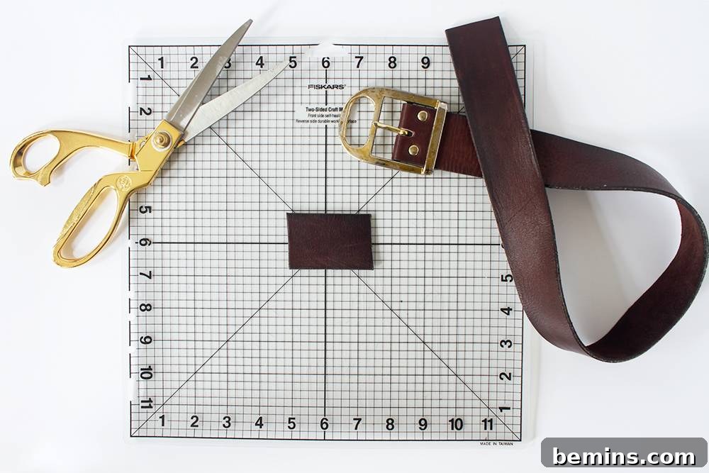 Simple Minimal Leather Earring Project 5 Cutting a suitable piece of leather from a belt for earring crafting.