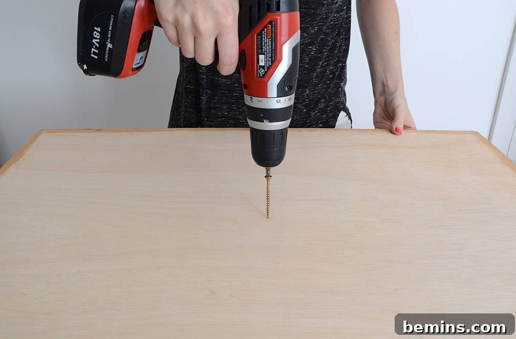 Craft Your Pup's Outdoor Oasis 13 Reinforcing dog bed legs with screws