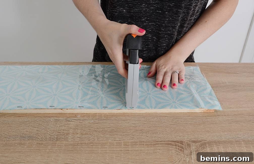 Craft Your Pup's Outdoor Oasis 8 Stapling fabric to side supports
