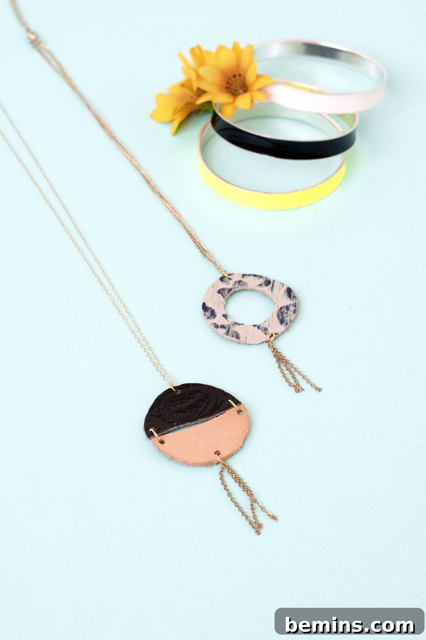 Circular leather pendants on a chain