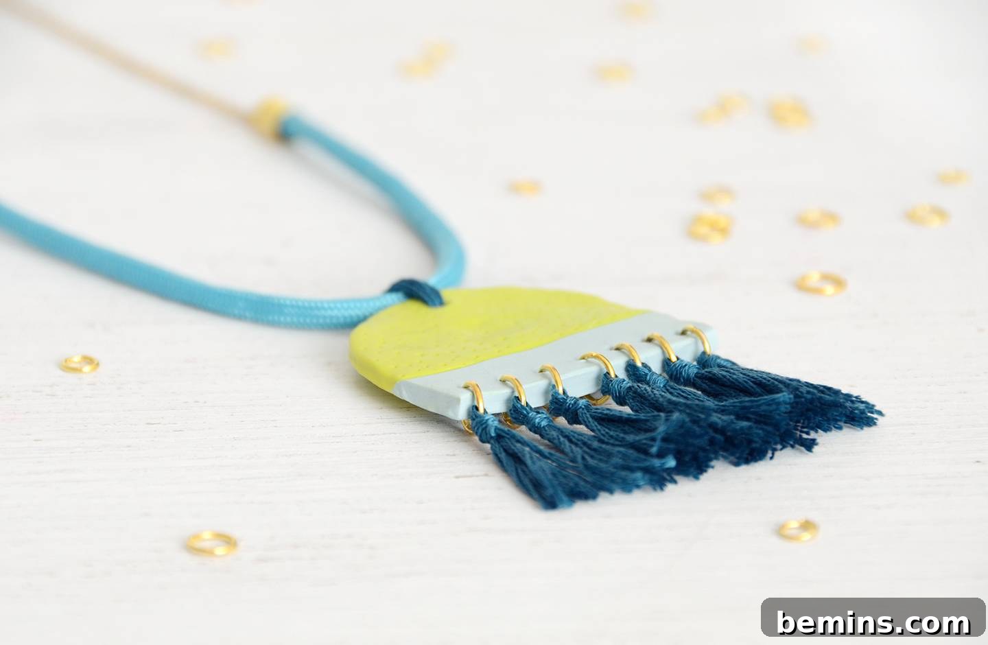 Create a One of a Kind Clay Pendant Tassel Necklace 16 Horizontal view of the DIY Clay Pendant Tassel Necklace, encouraging color experimentation