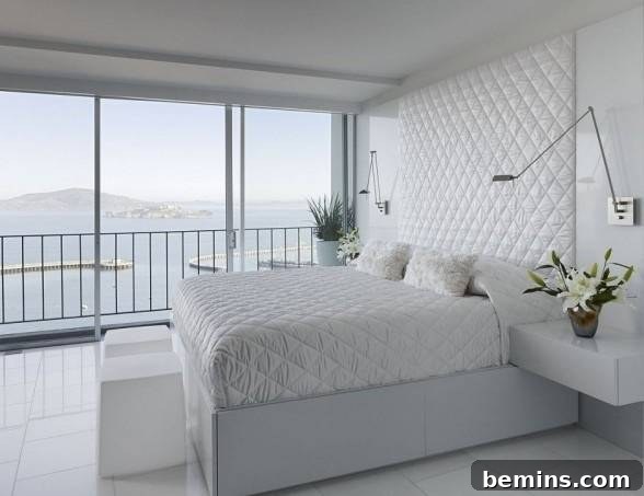 An all wide bedroom has a Mountain View outside.