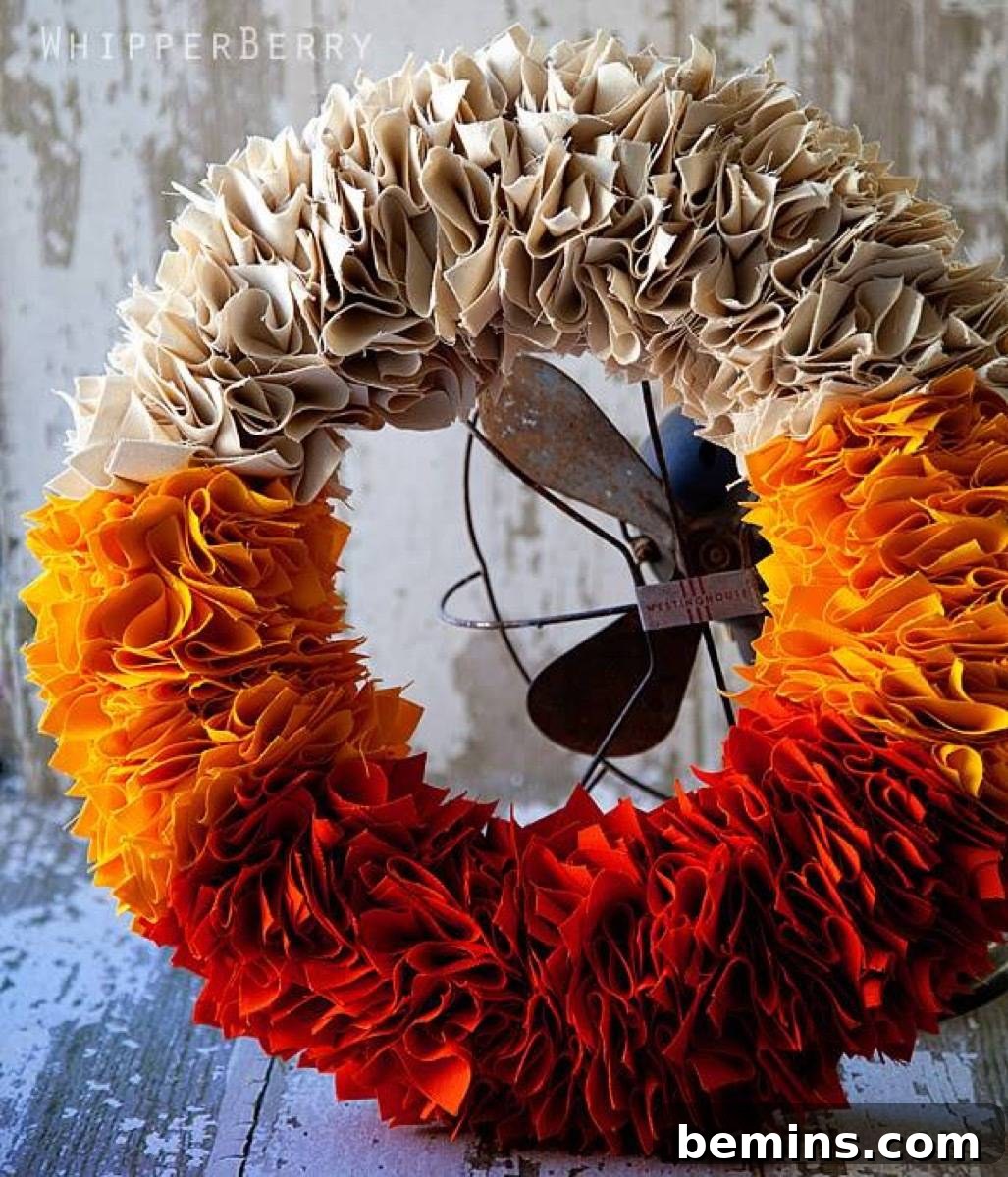 A candy corn wreath, a super cute and whimsical addition to your fall decor