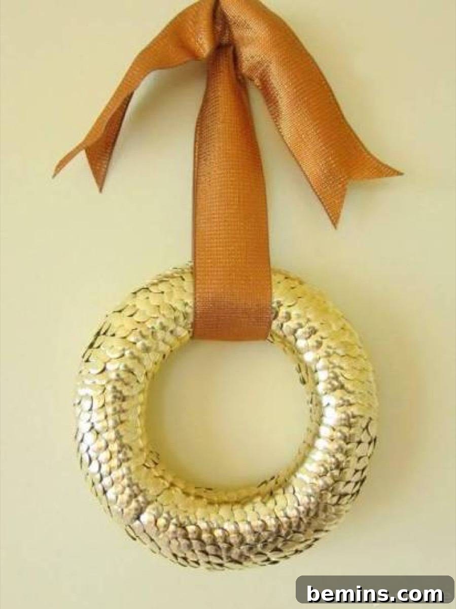 A metallic thumbtack wreath, adding a touch of glamour to your front door