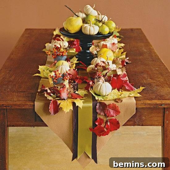 A fall leaf and fruit centerpiece, adding a touch of natural beauty to your dining table