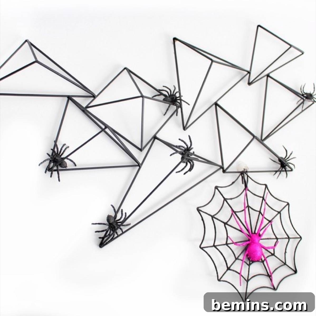 50+ Spooktacular DIY Halloween Home Decor Ideas 15 Geometric spider web wall decor