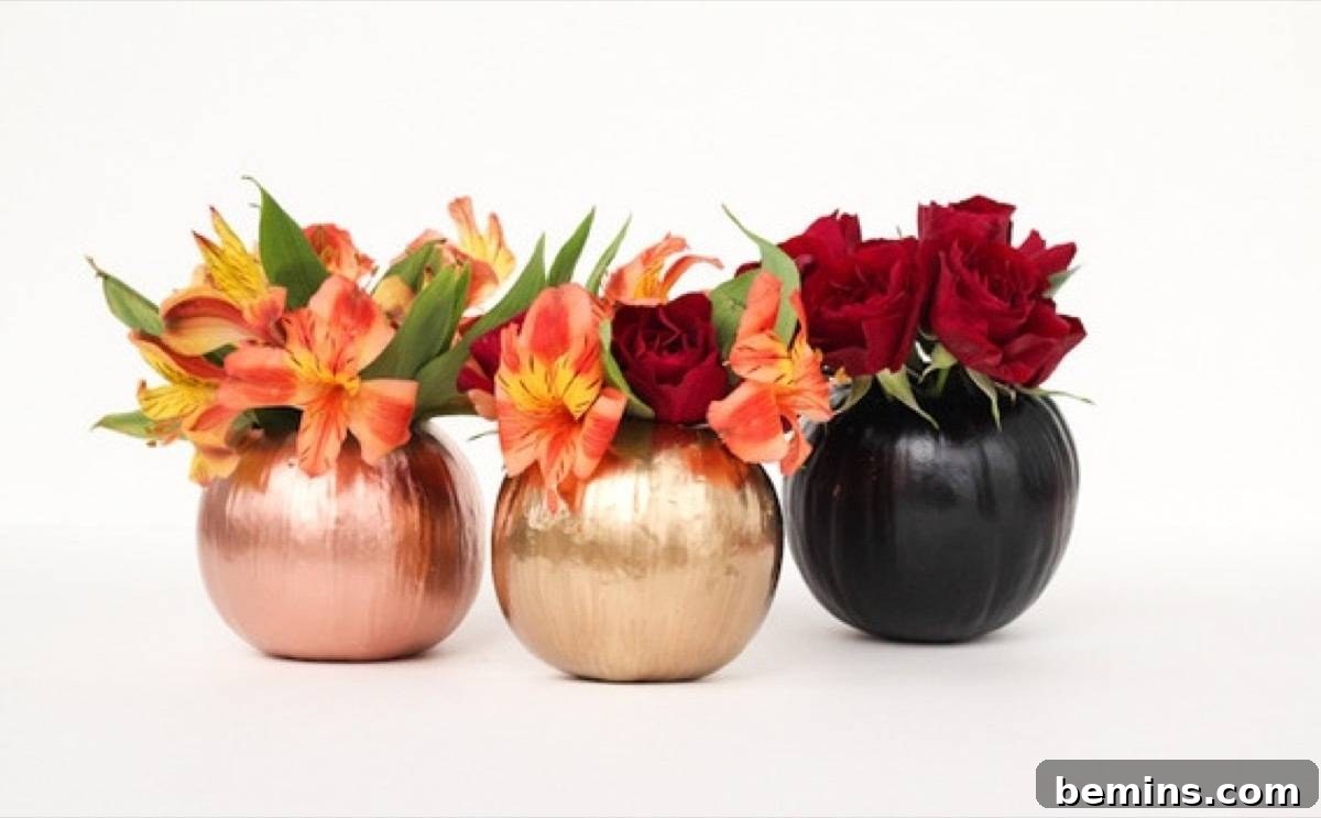50+ Spooktacular DIY Halloween Home Decor Ideas 17 Mini painted pumpkin vases