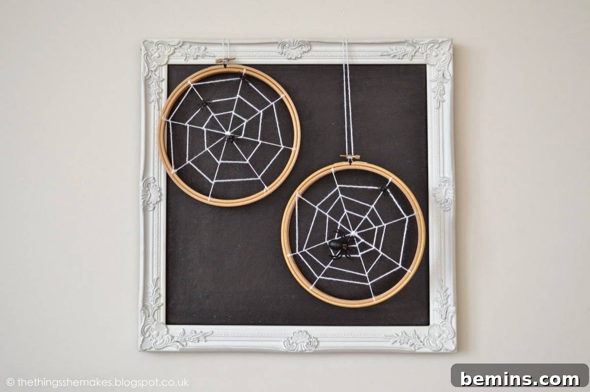 50+ Spooktacular DIY Halloween Home Decor Ideas 3 Embroidery hoop spider web