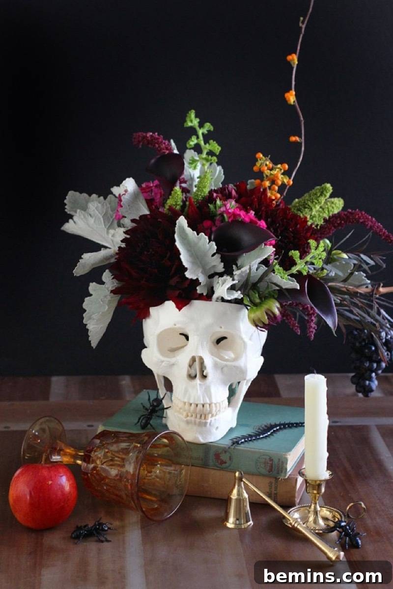 50+ Spooktacular DIY Halloween Home Decor Ideas 21 Skeleton vase