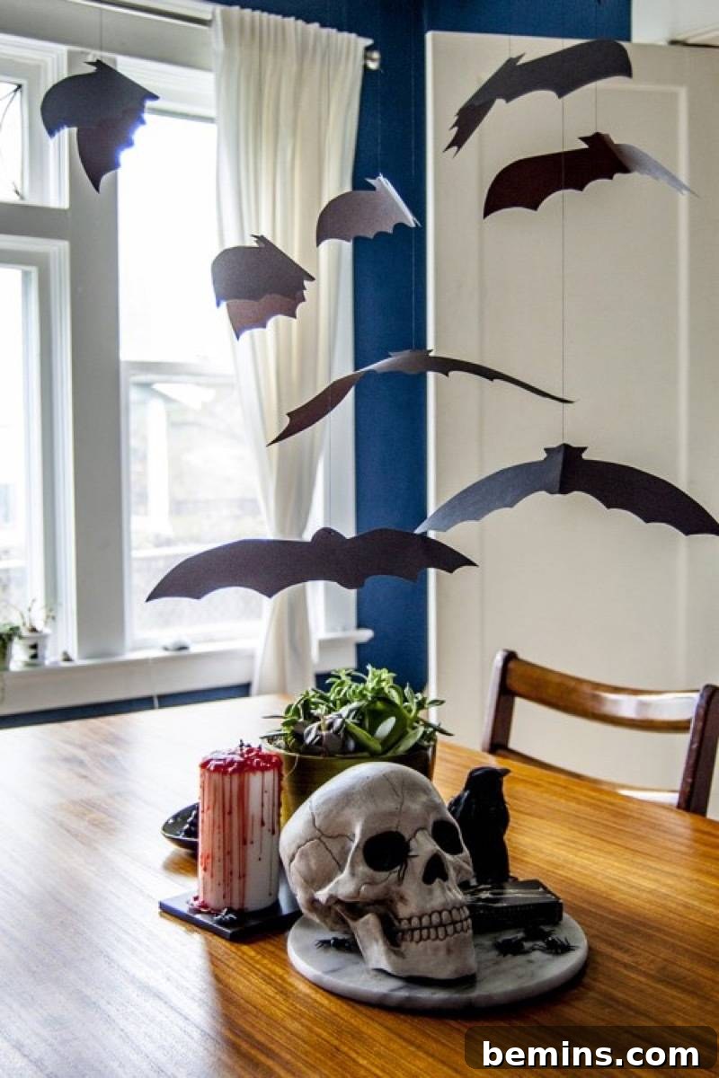 50+ Spooktacular DIY Halloween Home Decor Ideas 31 Bat mobile