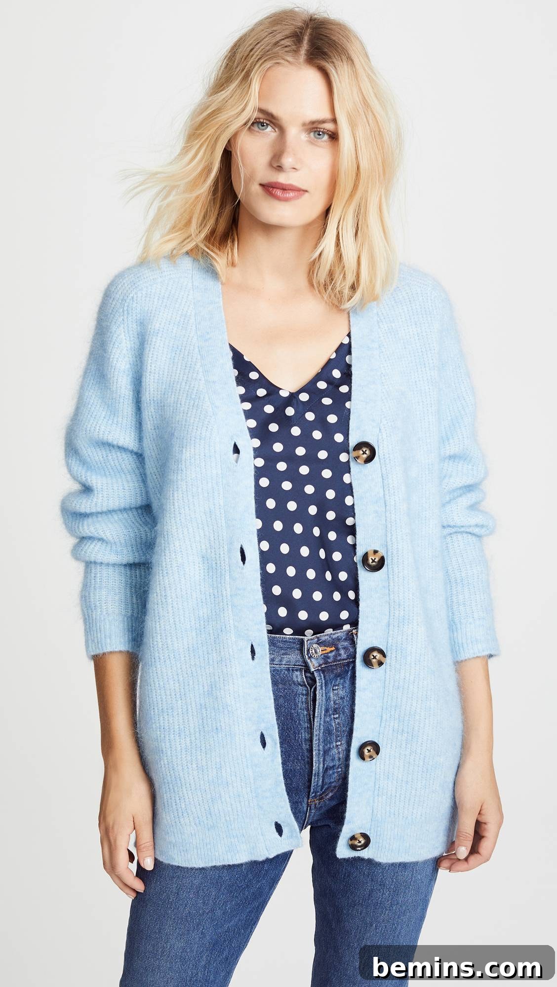 Pastel blue sweater, showcasing the color trend in fall fashion