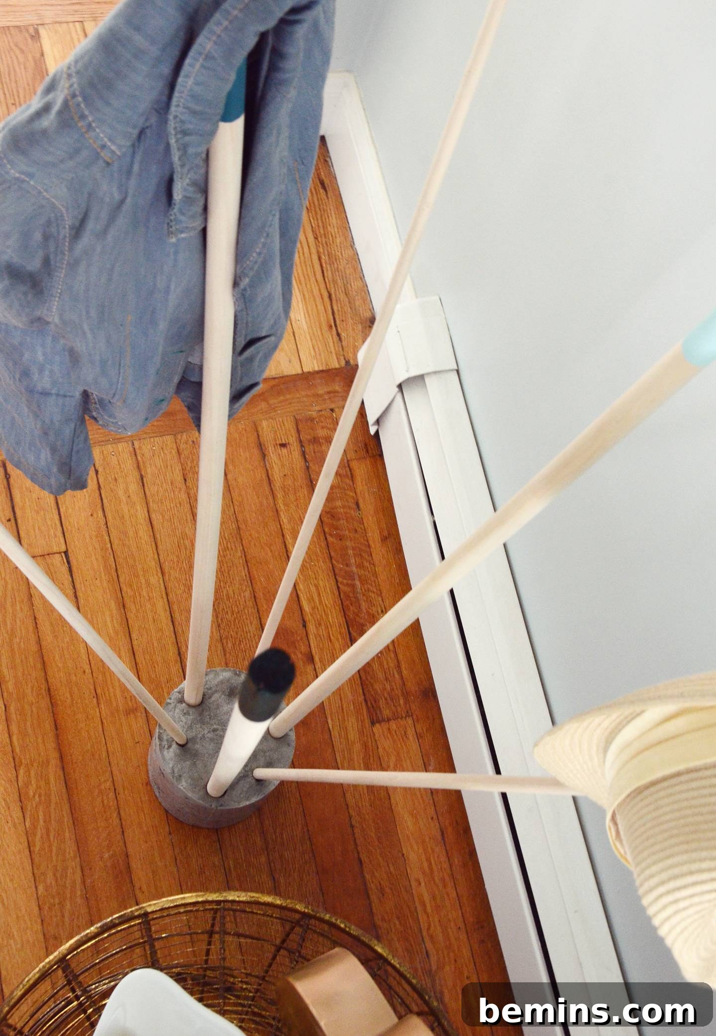 DIY Modern Wood and Concrete Coat Rack 11 DIY coat rack made from cement and wooden dowels
