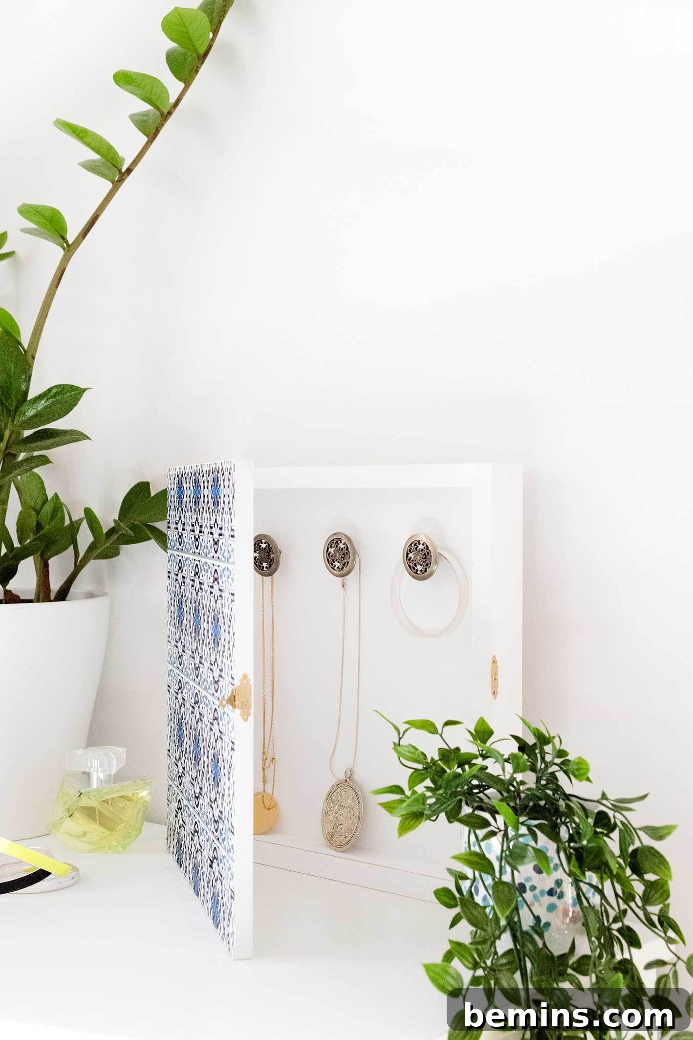 Jewelry organizer cleverly disguised as wall art
