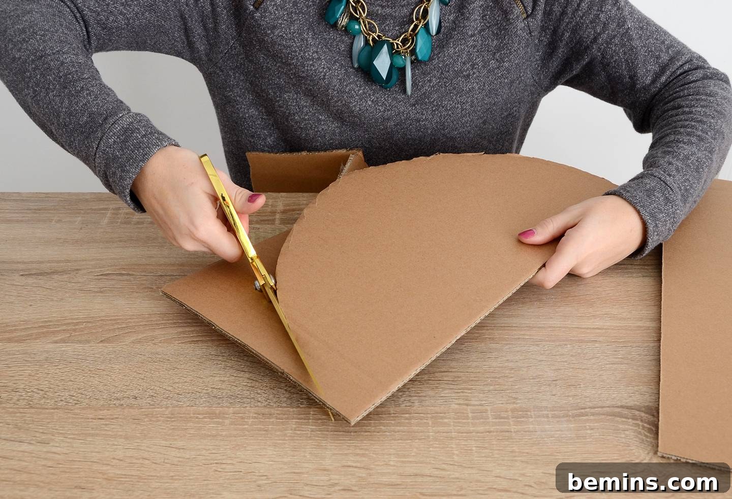 Cutting cardboard for the taco shell of a dog costume