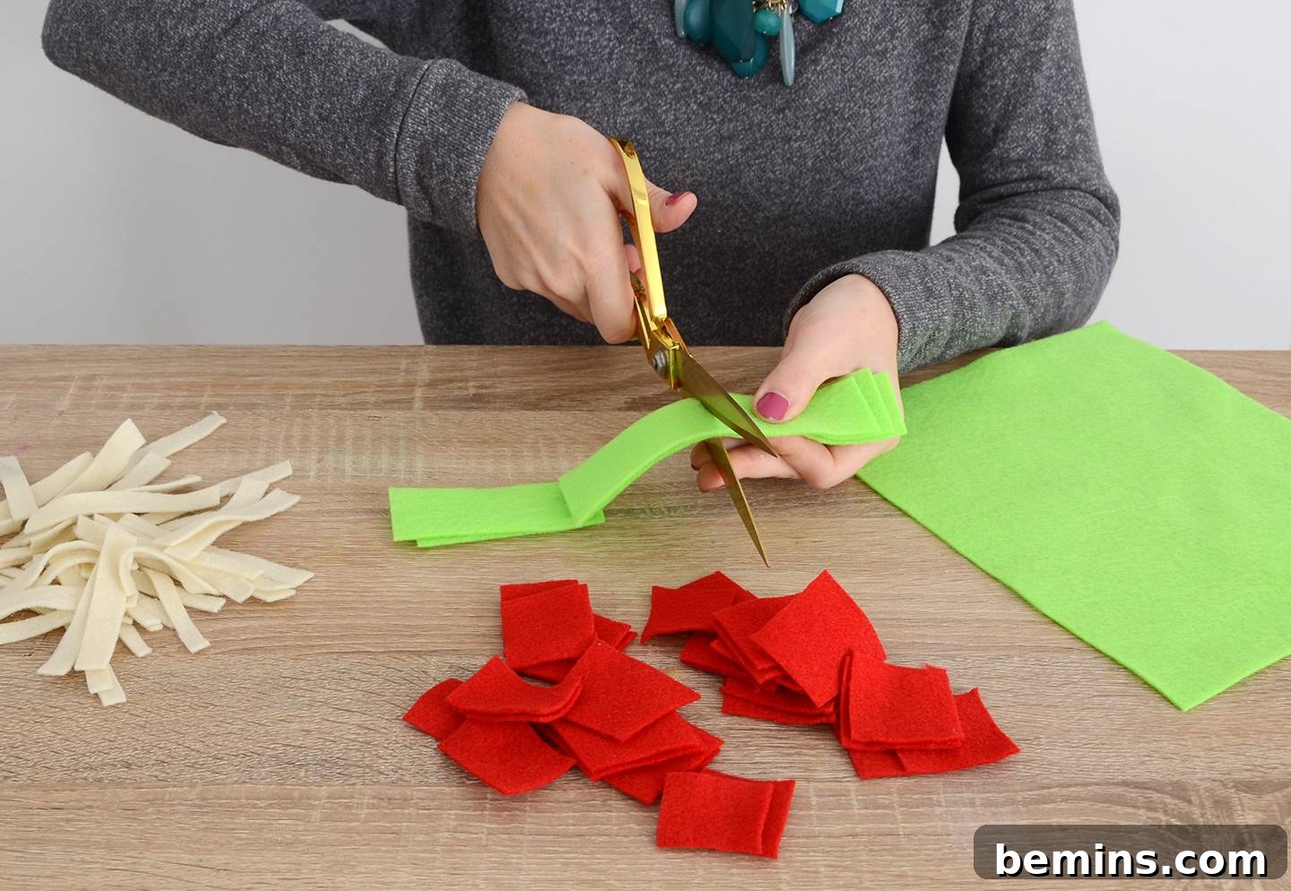 Cutting felt for the taco toppings: cheese, tomatoes, and lettuce