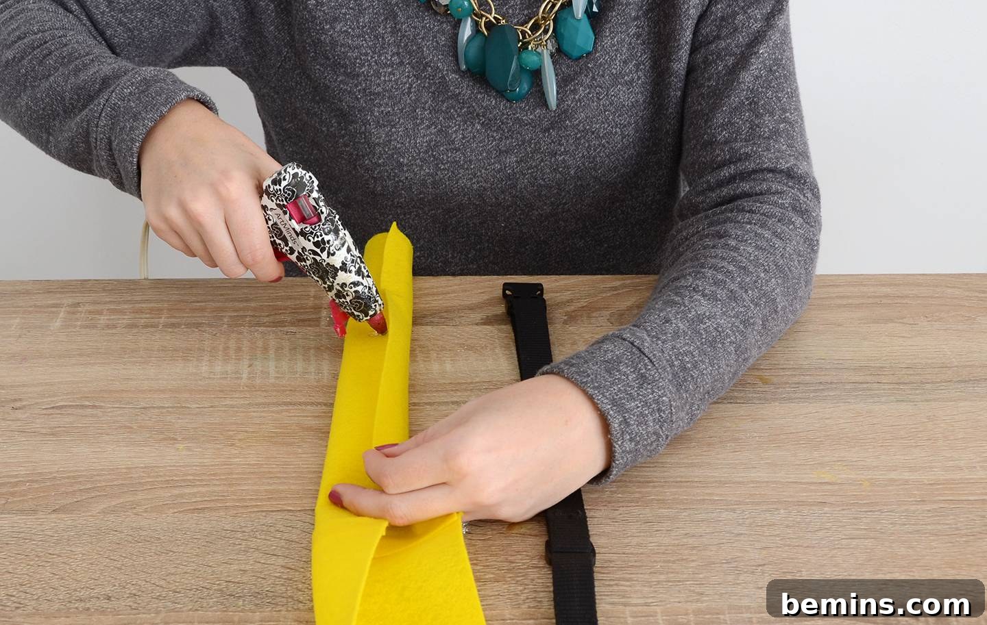 Creating a tube for the dog collar using yellow felt
