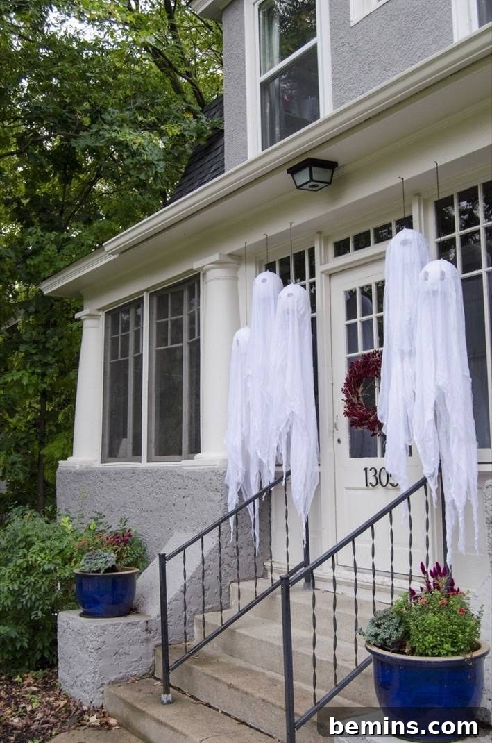 Wide shot of hanging ghost decor for Halloween