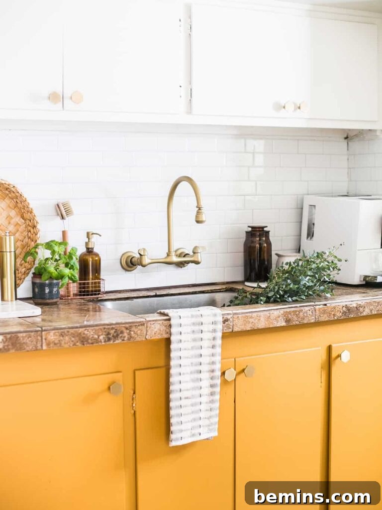 Budget-Savvy Backsplash Upgrades for Renters 2 White subway tiled kitchen backsplash
