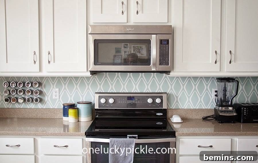 Budget-Savvy Backsplash Upgrades for Renters 11 Mid-mod removable backsplash using peel-and-stick wallpaper
