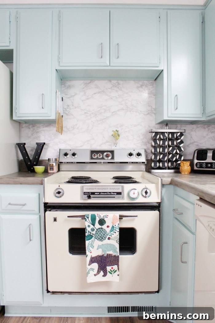 Budget-Savvy Backsplash Upgrades for Renters 15 DIY marble backsplash using contact paper