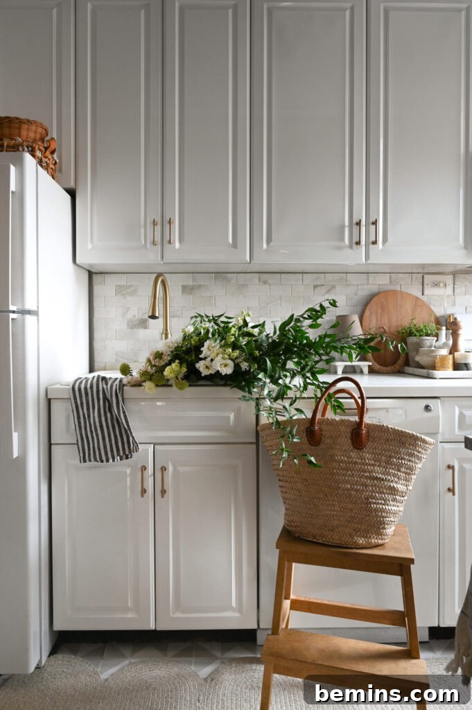 Budget-Savvy Backsplash Upgrades for Renters 31 White and gray tiled kitchen