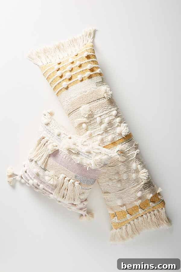 Winter Sunset Pillow: Muted pastel tones give this vintage style tassel pillow a contemporary feel.