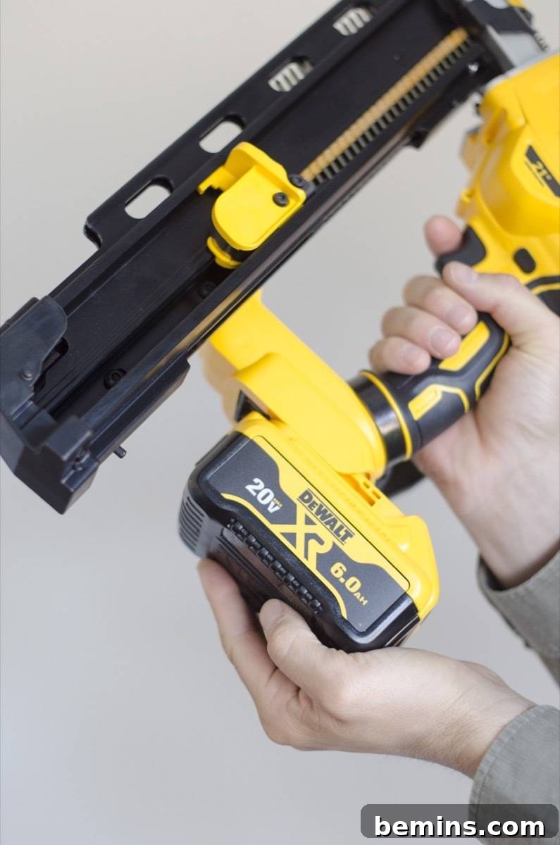 Loading battery on Dewalt framing nailer