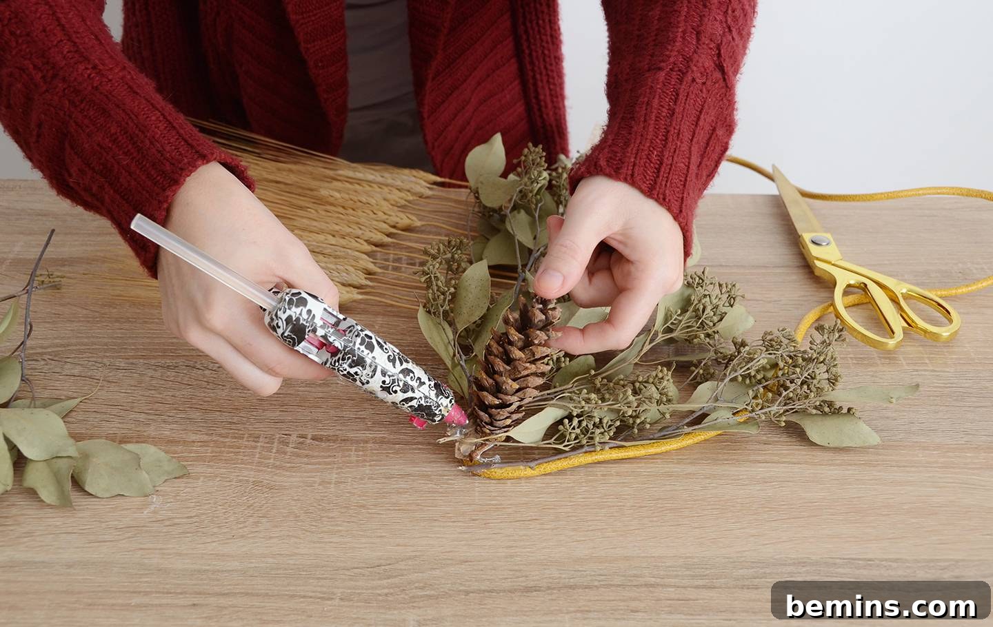 Adding Pinecones and Flowers