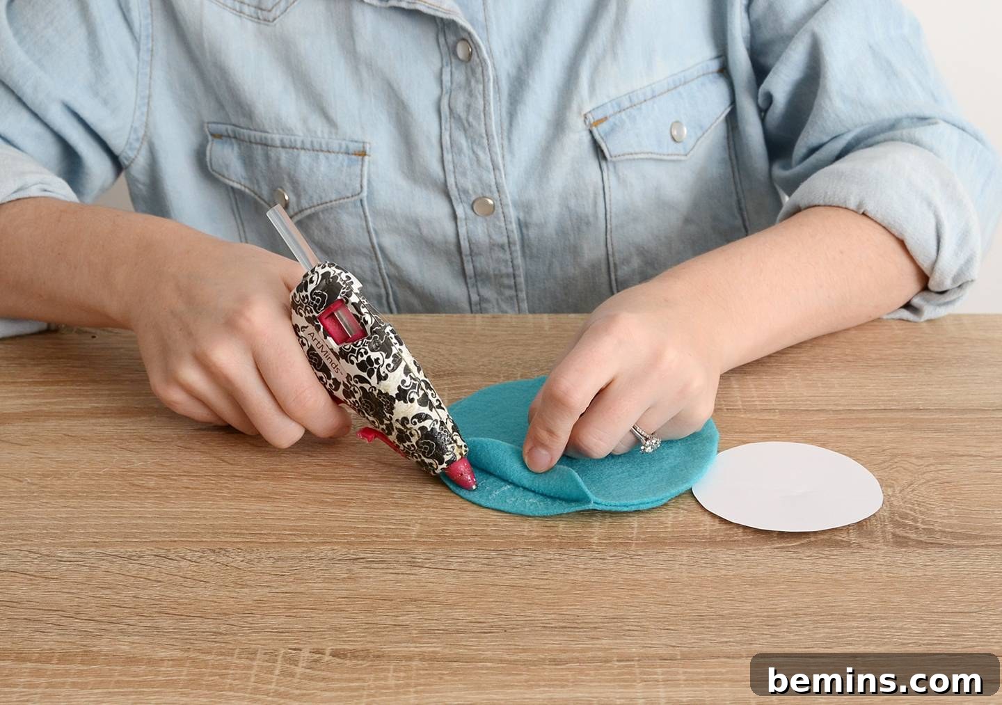 DIY Felt Wine Glass Coasters: A Stitch-Free Project 9 Adding extra glue to secure the edges of the wine coaster.