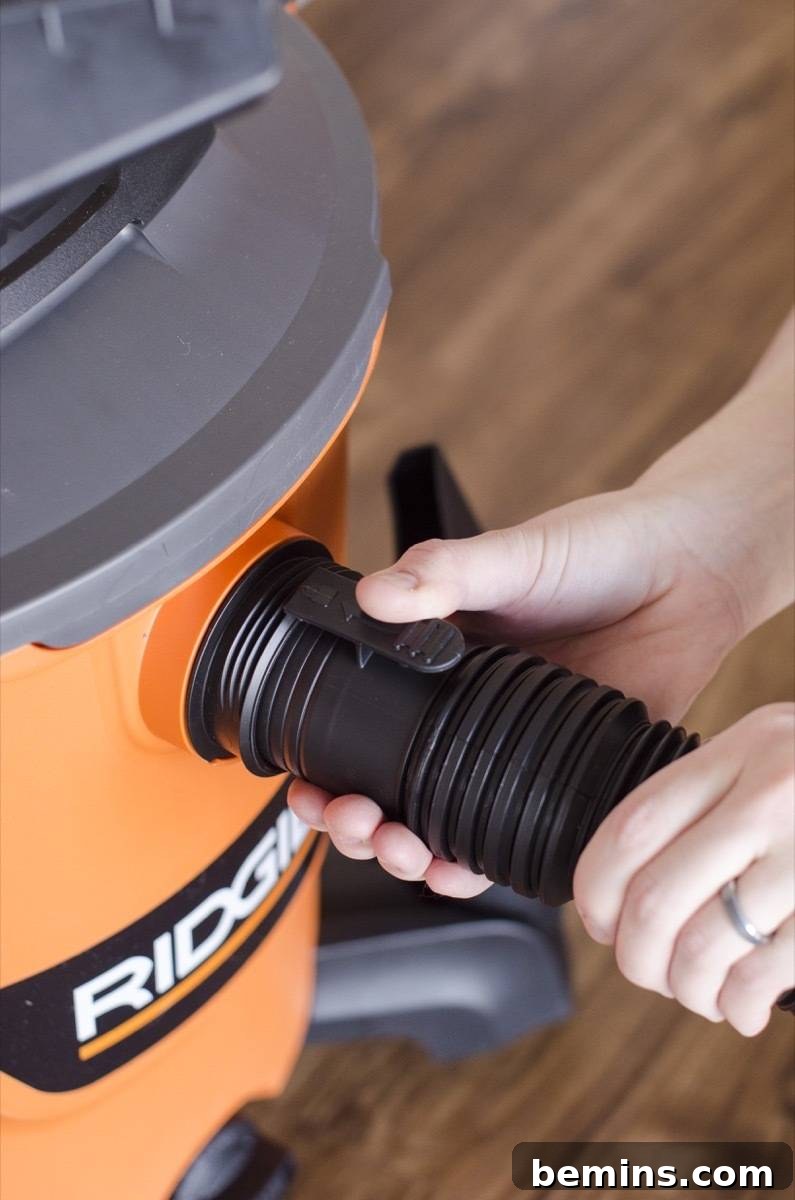 RIGID NXT Wet/Dry Vac: A Tool School Review 5 Attaching the Hose to the RIDGID Shop Vac with Locking Mechanism