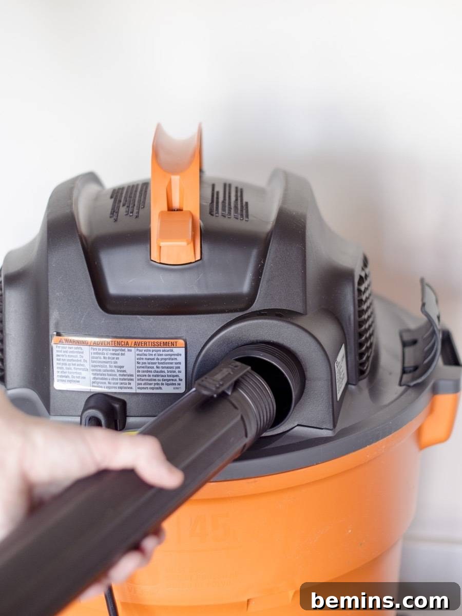 RIGID NXT Wet/Dry Vac: A Tool School Review 6 Hose Inserted in the RIDGID Shop-Vac for Vacuuming